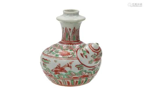 A Wu Tsai porcelain kendi, decorated with flowers and fish. ...