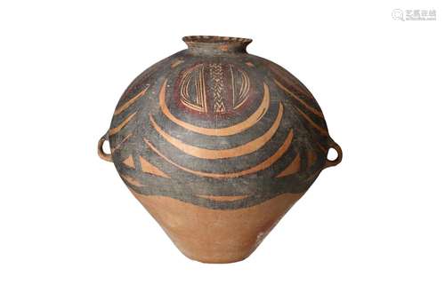 A Neolithic pot with two small ears and a geometric decor. U...