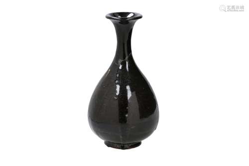 A pear-shaped black glazed Cizhou ware Yu Hu Chun vase. Unma...