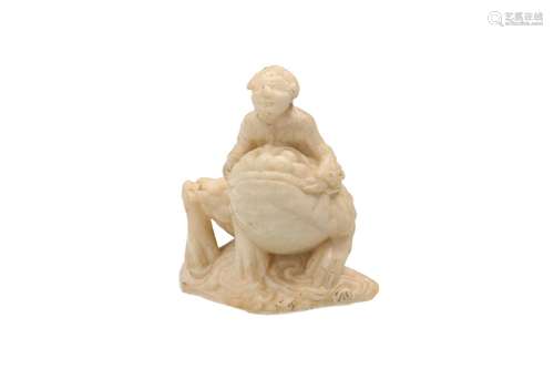 A marble sculpture of a three legged toad with figure on his...