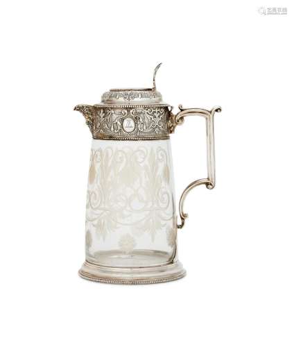 A VICTORIAN SILVER MOUNTED CLARET JUG BY WILLIAM & GEORG...