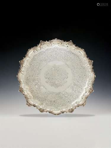 A WILLIAM IV SILVER LARGE SHAPED CIRCULAR SALVER BY PAUL STO...