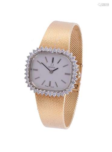 OMEGA, A LADY'S TWO COLOUR 18 CARAT GOLD AND DIAMOND BR...