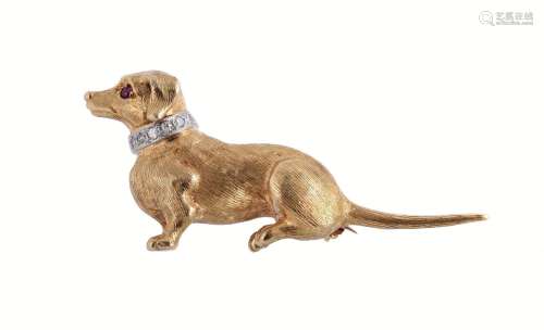 A 1960S 18 CARAT GOLD RUBY AND DIAMOND DACHSHUND BROOCH BY B...
