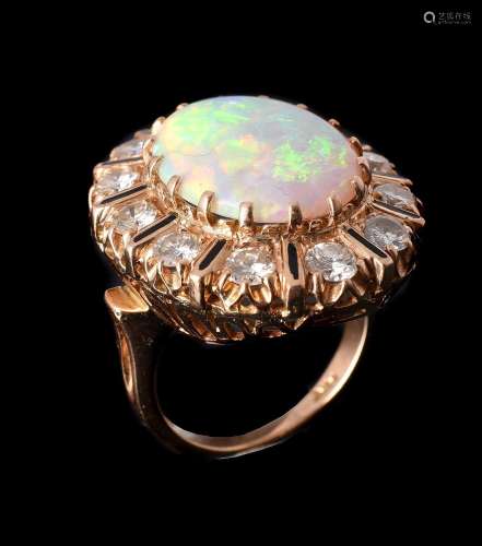 AN OPAL AND DIAMOND CLUSTER DRESS RING