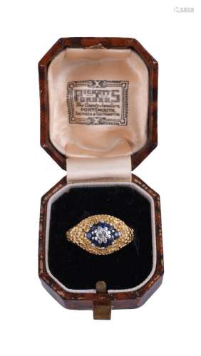 A 1970S SAPPHIRE AND DIAMOND CLUSTER DRESS RING