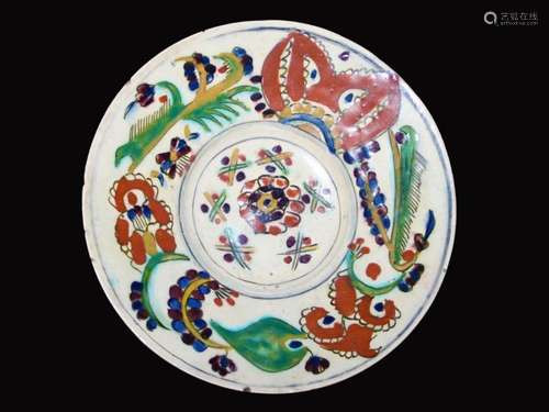 A KUTHAYA POTTERY SAUCER