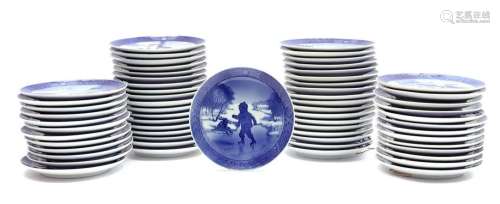 62 porcelain Christmas plates