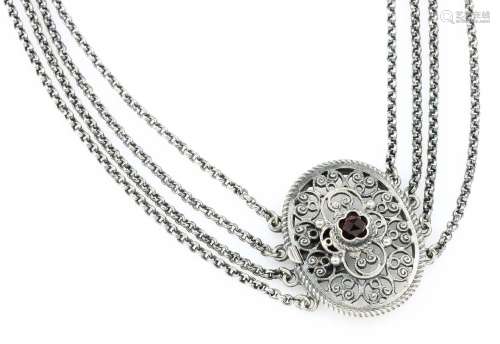 Necklace with filigree work and garnet