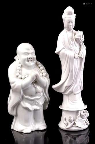 2 white porcelain figurines
