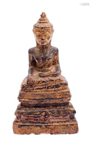 Antique wooden sitting Buddha