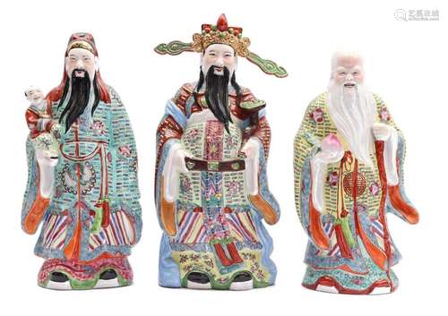 3 glazed earthenware statues