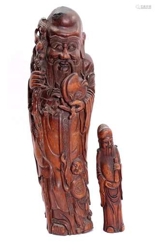 2 wooden statues