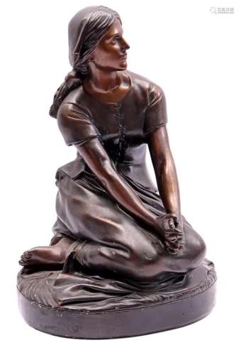Bronze-coloured plaster statue