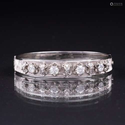 A Diamond Bangle Bracelet.