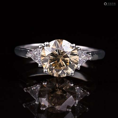 A Fancy Solitaire Diamond Ring with Triangle Diamonds.