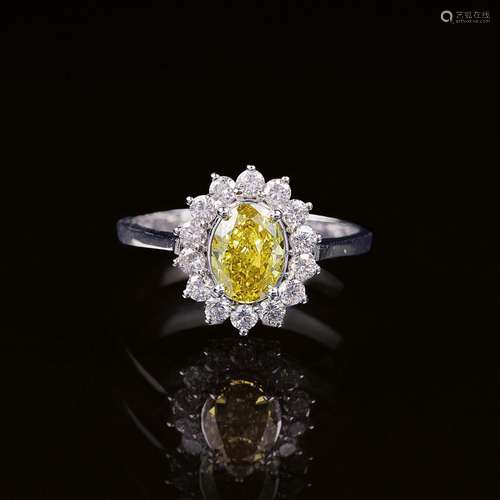 A Vivid Fancy Diamond Ring.