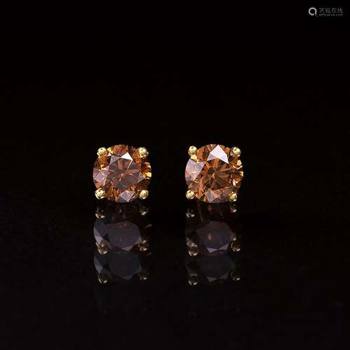 A Pair of Fancy Diamond Solitaire Earstuds.