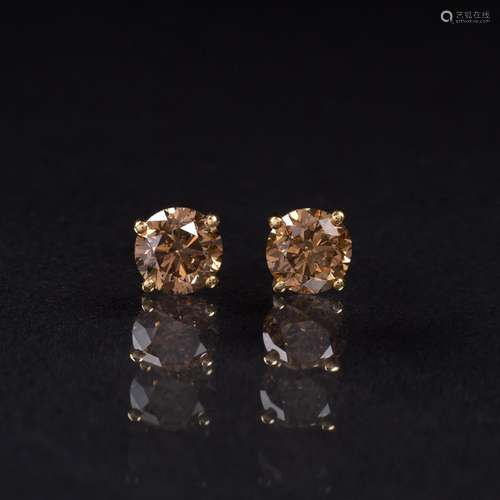 A Pair of Fancy Diamond Solitaire Earstuds.