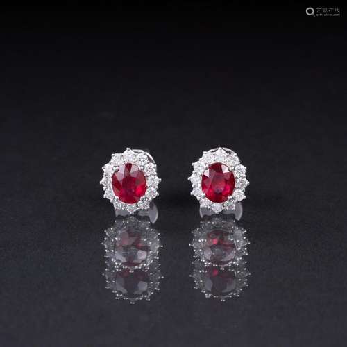 A Pair of small Ruby Diamond Earstuds.