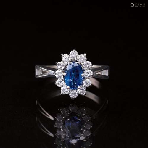 A petite Sapphire Diamond Ring.