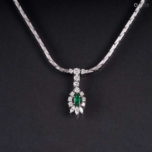 An Emerald Diamond Necklace.