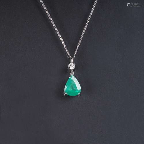 An Emerald Pendant with Solitaire Diamond on Necklace.