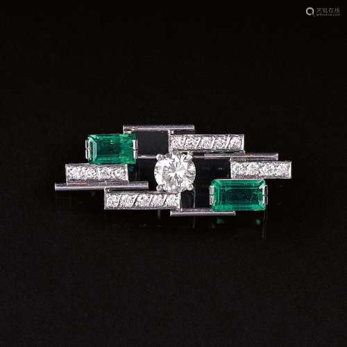 A Brooch with Emerald and Solitaire.