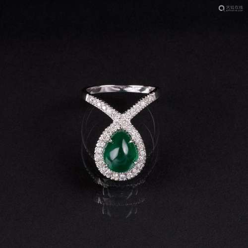 A modern Emerald Diamond Ring.