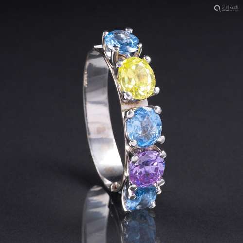 A Colourful Topaz Bangle Bracelet.