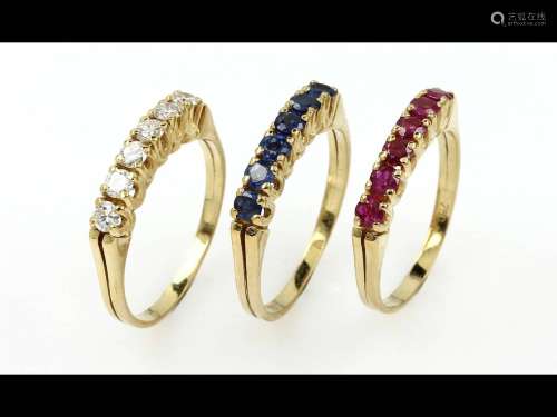 18 kt gold ringtrio with coloured stones