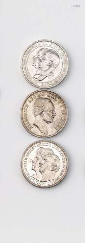 Drei Silbermünzen