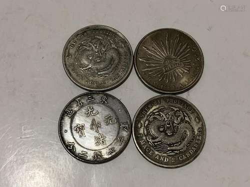 Four Chinese Coins