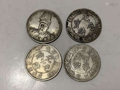 Four Chinese Coins