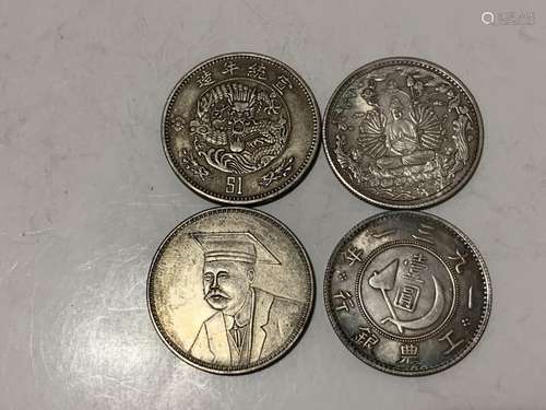 Four Chinese Coins