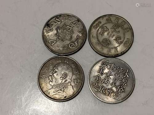 Four Chinese Coins