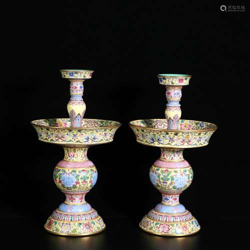 A Pair Of Yellow Ground Famille Rose Porcelain Candlesticks ...