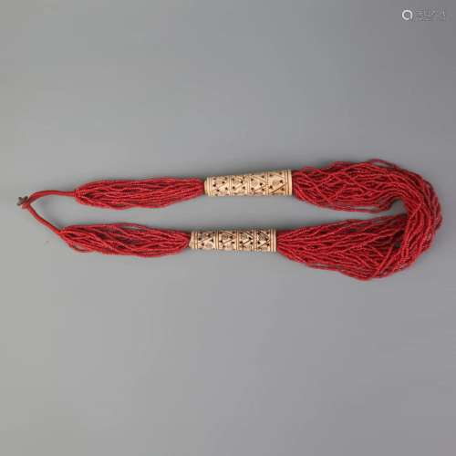 A RED CORAL WITH BONE NECKLACE