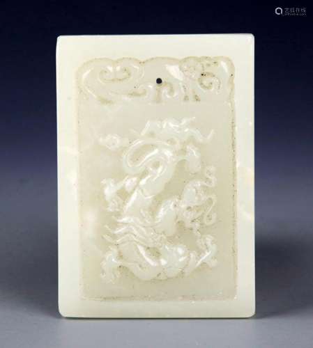 A FINE DRAGON CARVING PALE CELADON JADE PENDANT