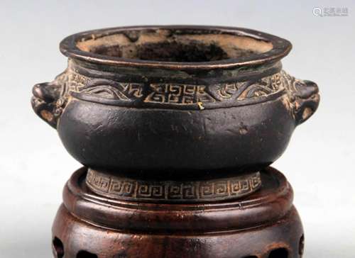 A FINELY CARVED ROUND BRONZE CENSER