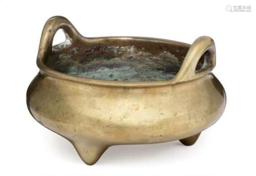 A Chinese tripod bronze censer with vertical handles