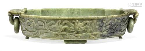 A Chinese oval green jade marriage bowl on four feet