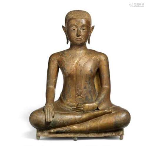 A Thai gilt bronze figure depicting a monk