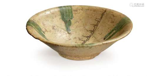 A Samanid Nishapur pottery bowl decorated with green splash ...