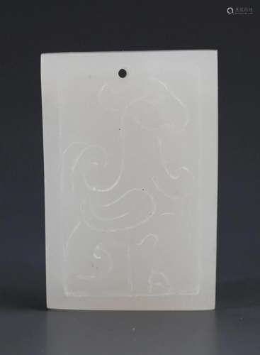 A FINE WHITE JADE PENDANT WITH BIRD CARVING