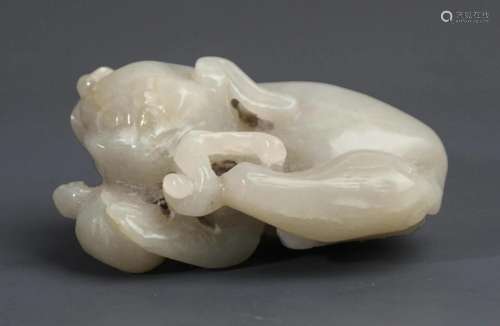 A PALE CELADON JADE RUI SHOU FIGURE