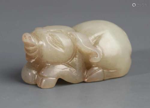 A FINE PALE CELADON JADE IN FIGURE OF PIG