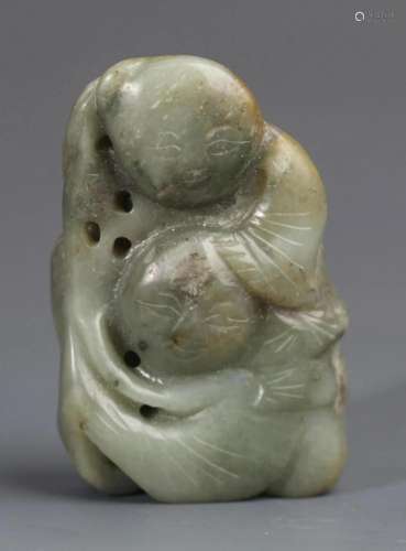 A FINE PALE CELADON JADE IN FIGURE OF BOY