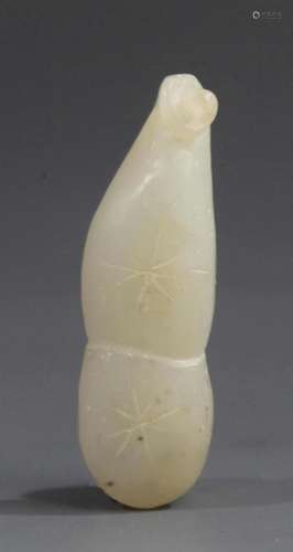 A FINE CUCURBIT SHAPED PALE CELADON JADE PENDANT