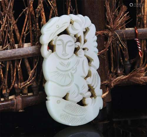 A FINE BOY CARVING PALE CELADON JADE PENDANT